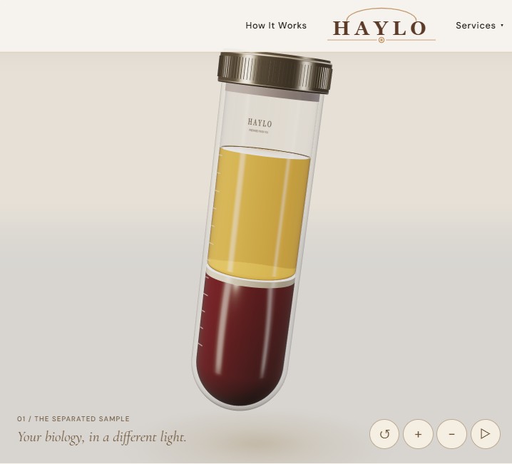 A glass vial with golden plasma above a thin pale interface and a red blood cell layer.